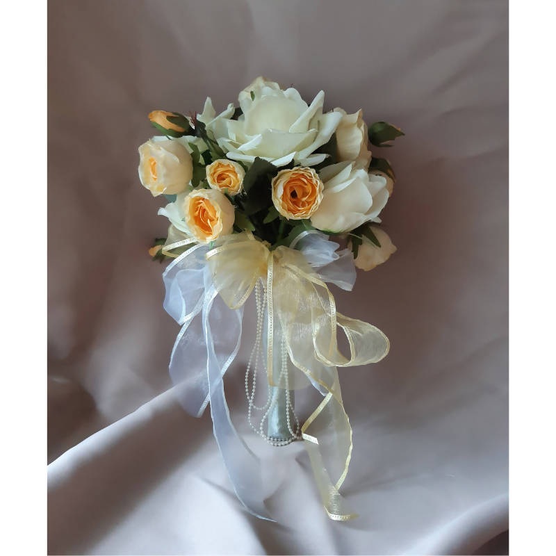 Yellow Artificial Roses Hand Bouquet ( Nationwide Delivery)